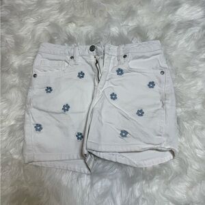 White Jean Shorts with Blue Floral Accents